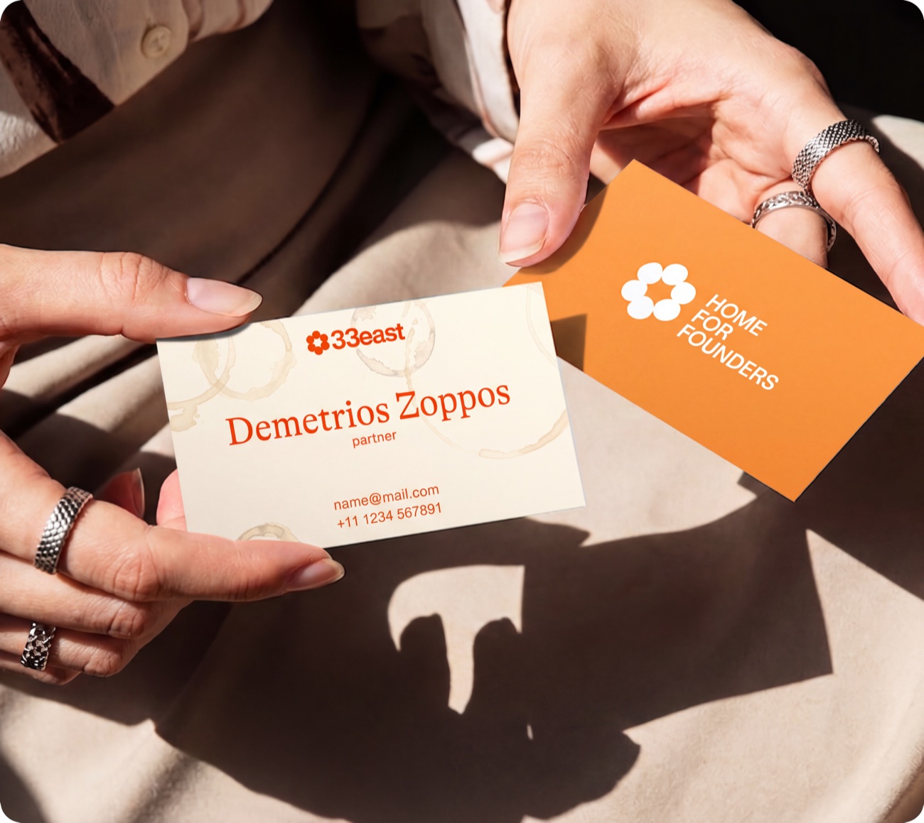 33east business cards held in hand