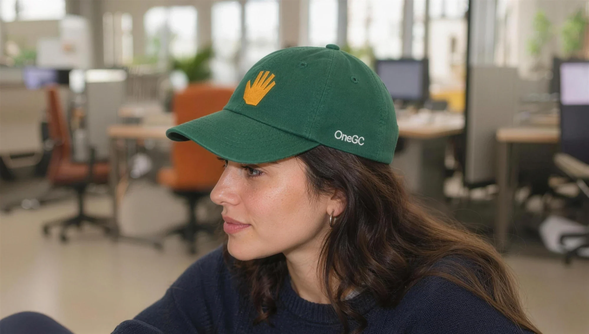 Green OneGC cap with the embroidered hand icon