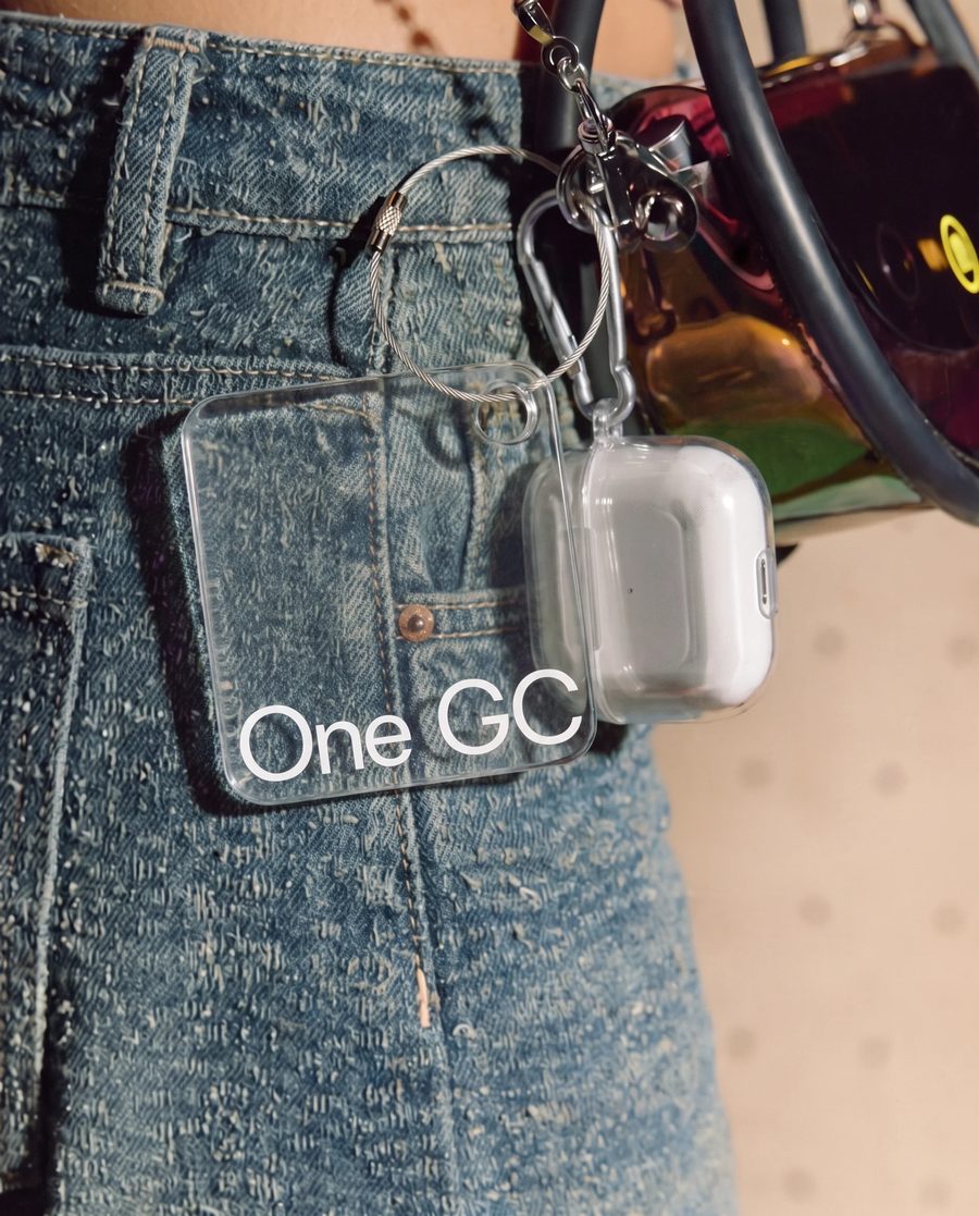 OneGC acrylic keychain on jeans