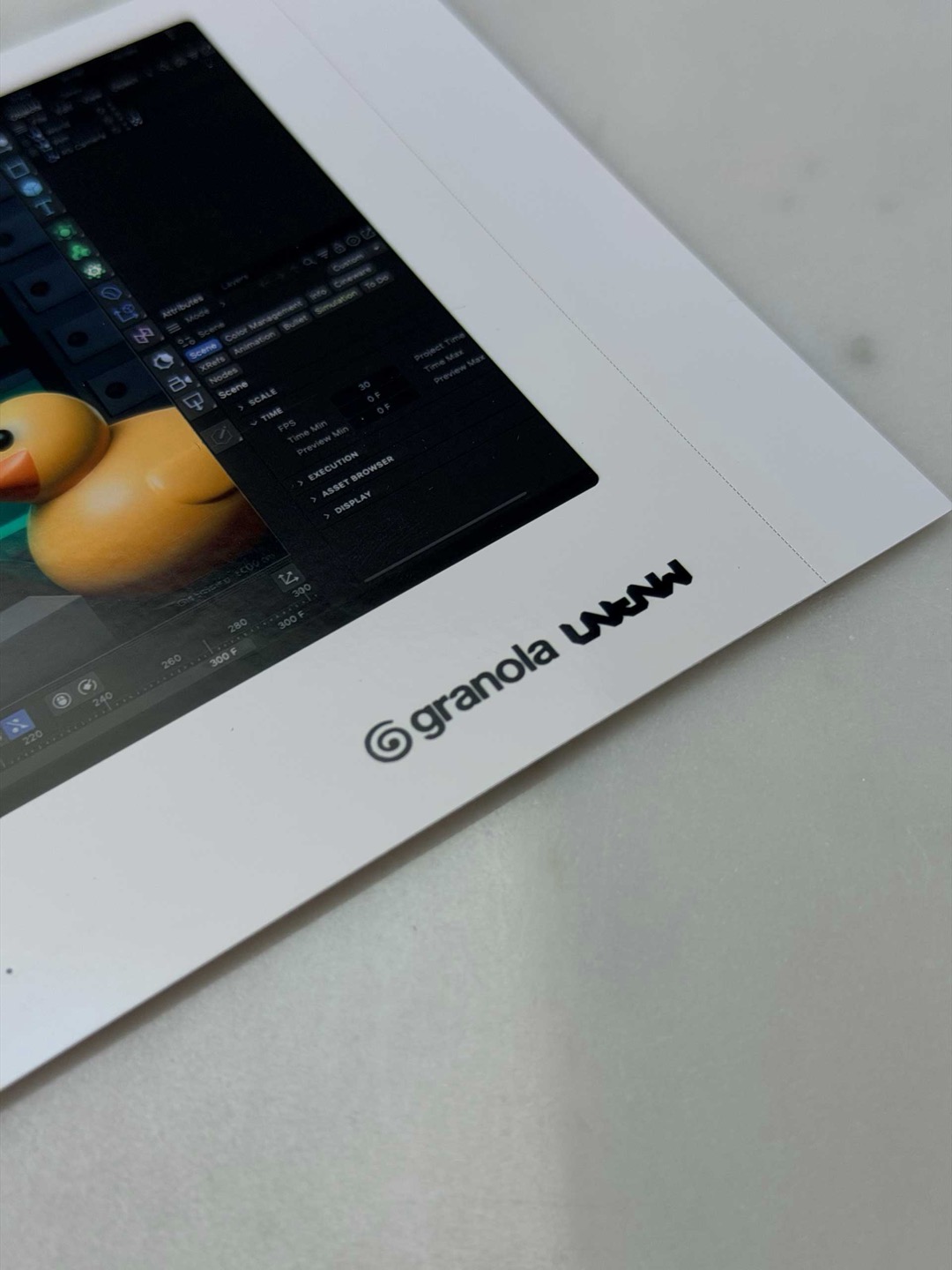 The take-home card — a 3D duck rendered in Cinema 4D, stamped granola × UNKNW